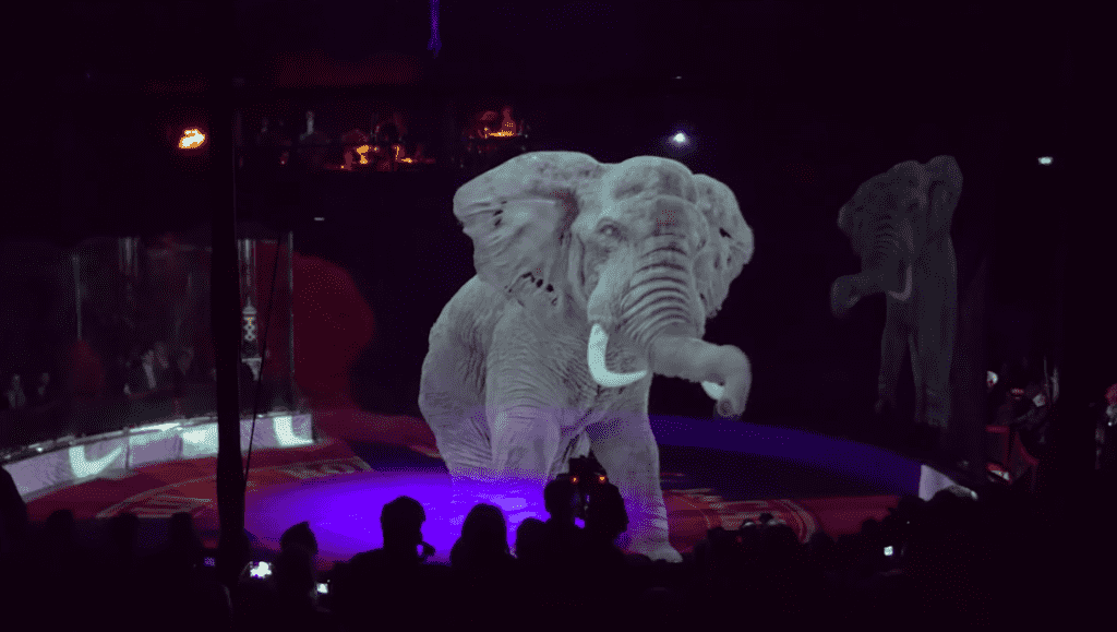 Shots of the holographic circus animals being employed by the German Circus Roncalli.