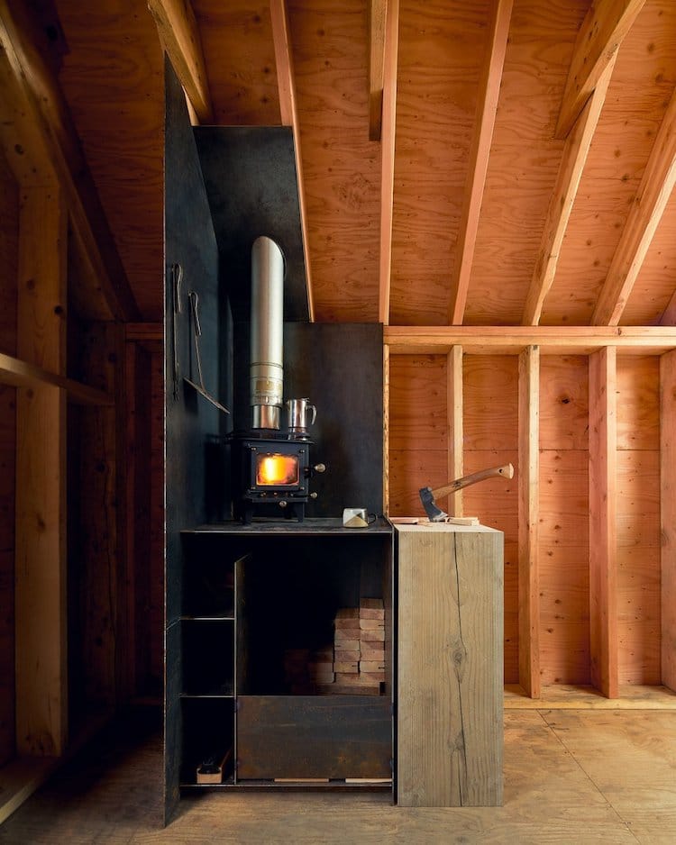 The wood-burning stove that heats the Site Shack interiors.