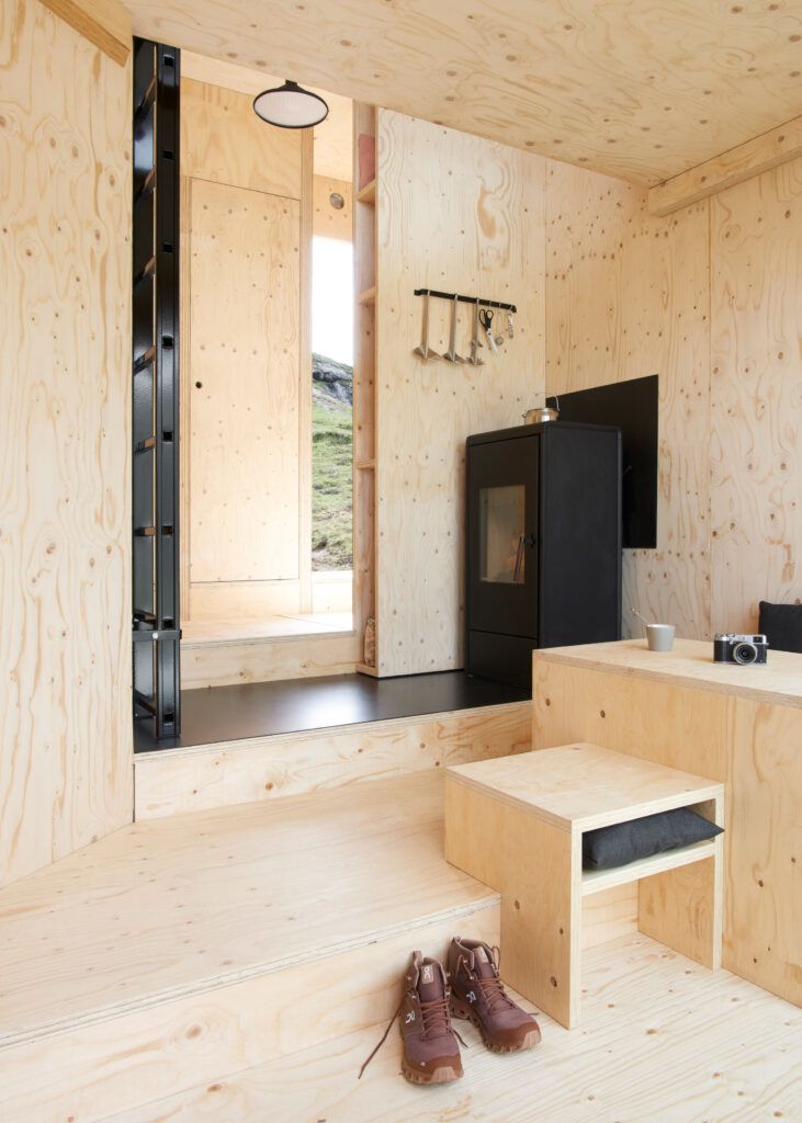 The simple wooden interiors of the On Mountain Hut