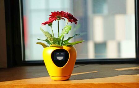 The Lua Smart Planter displays a happy expression