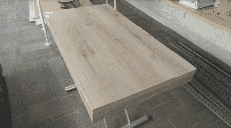 Expand's Alzare Transforming Coffee Table at Dining Table height (folded).
