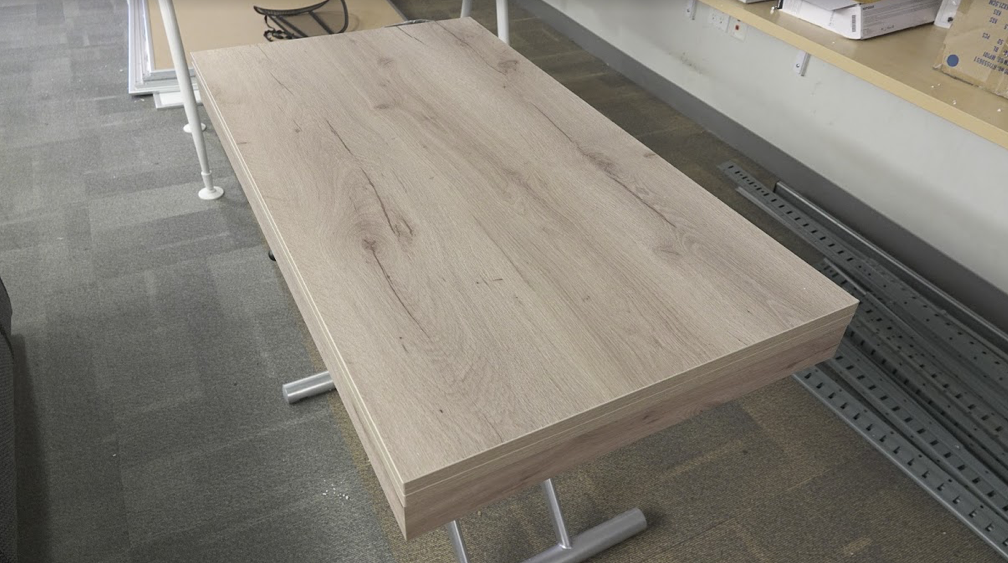 Expand's Alzare Transforming Coffee Table at Dining Table height (folded).