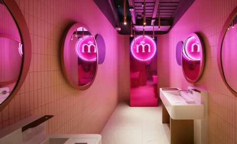 Bathrooms with neon pink lights