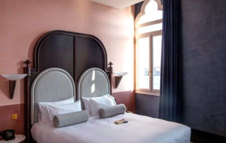 A bedroom inside Venice's Hotel Il Palazzo Experimental