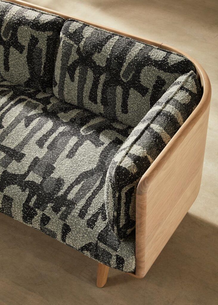 Upholstered chair featured in the sustainable new Sage furniture collection. Designed by Benchmark in collaboration with the Rockwell Group