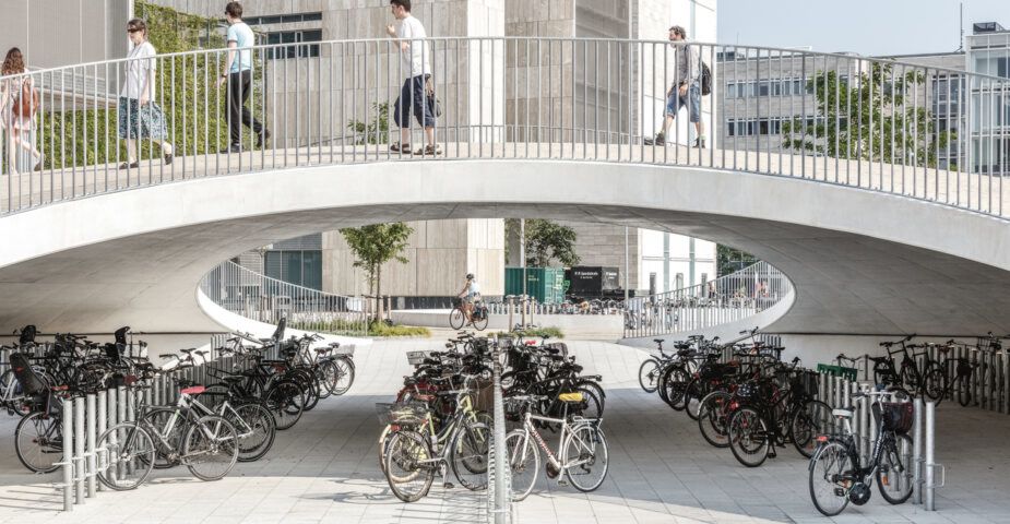 The COBE-designed Karen Blixens Plads in Copenhagen, complete with a sleek under-bridge bicycle parking lot
